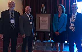 Dr. Jessica Kogel of NIOSH presents the 2016 Mine Safety and Health Technology Innovations Award for industrial minerals to Tronox Alkali.